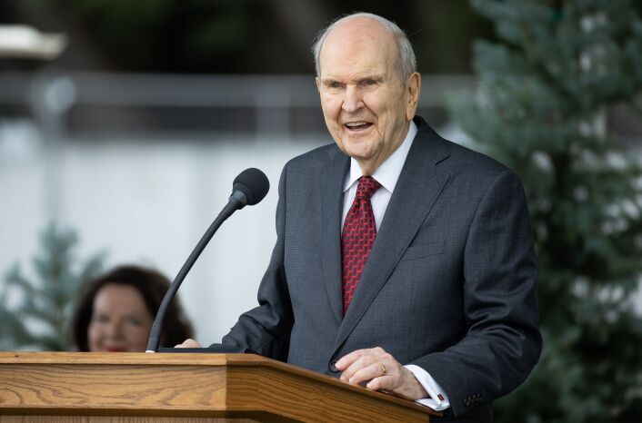 Prophet and President Russell M Nelson giving a speech at a pulpit